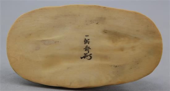 A Japanese ivory okimono, Meiji period, 7.6cm., slight losses